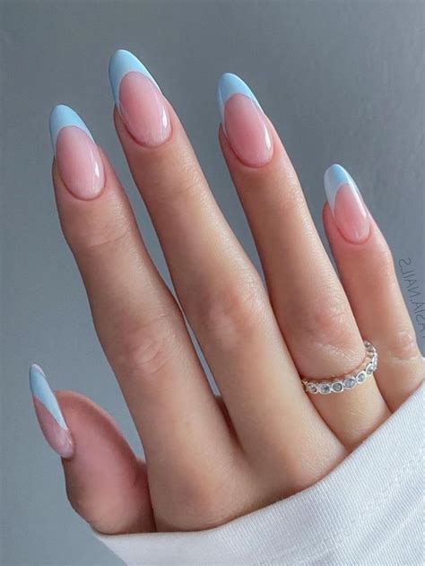 pastel blue french tip nails.